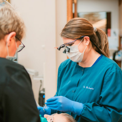 Brittany McLaughlin examining a patient